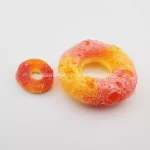 Peach Ringz: Crunchy Gummy Rings With The Sweet Essence Of Ripe Peaches, A Fruity Delight For Your Taste Buds.