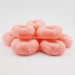 Watermelon Ringz: Vibrant, Gummy Fruit Rings Bursting With Juicy Watermelon Flavor, A Refreshing Sweet Treat.